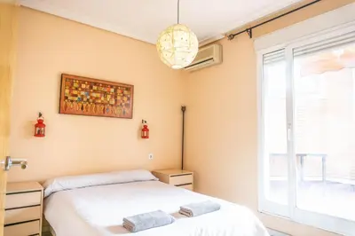 Cama o camas de una habitación en Buhaira Apartment