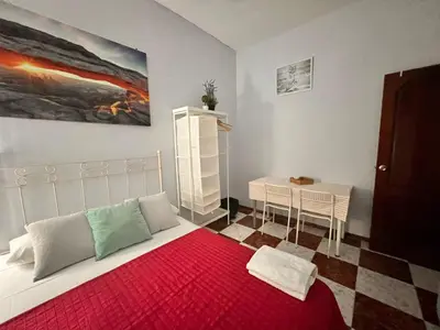 Cama o camas de una habitación en Santa Isabel Low Cost Rooms in private house
