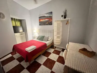 Cama o camas de una habitación en Santa Isabel Low Cost Rooms in private house