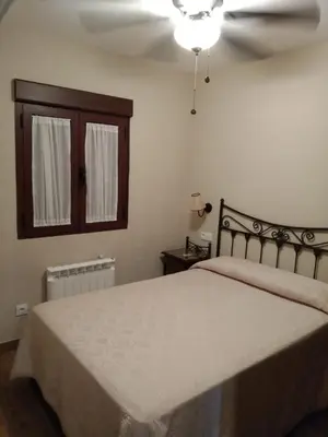 Cama o camas de una habitación en EL REFUGIO DE POPEA