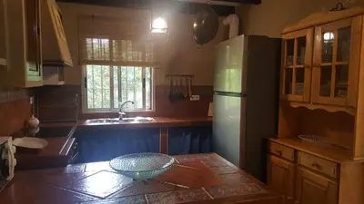 Una cocina o zona de cocina en EL REFUGIO DE POPEA