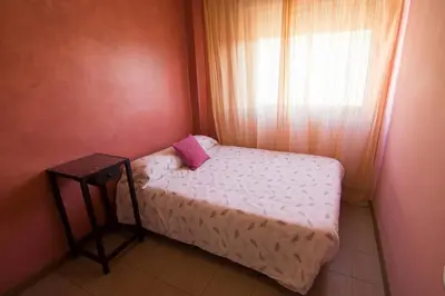 Cama o camas de una habitación en Apartamento en Mezquita Puente de San Rafael No. 9