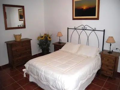 Cama o camas de una habitación en Rustic Retreat in Andalusia