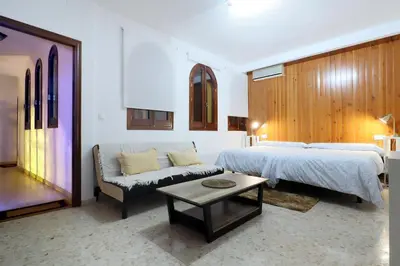 Cama o camas de una habitación en La Terraza de Alfaros & Parking Gratuito