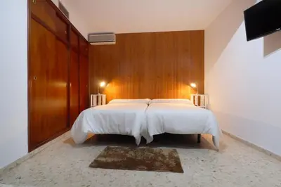 Cama o camas de una habitación en La Terraza de Alfaros & Parking Gratuito
