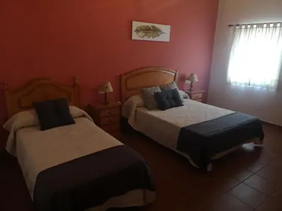 Cama o camas de una habitación en CASA RURAL LA DEHESILLA