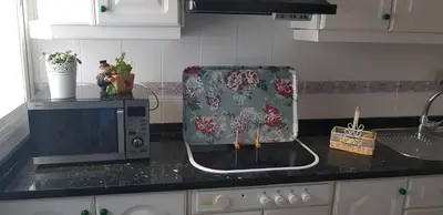 Una cocina o zona de cocina en Apartamento frente a Palacio de Congresos (Fibes)