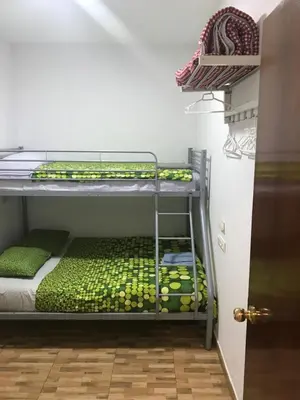 Cama o camas de una habitación en CASA SUR APARCAMIENTO GRATIS