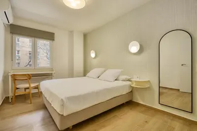 Cama o camas de una habitación en SUNN Amador de los Ríos, by Homing U