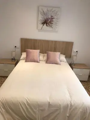 Cama o camas de una habitación en Casa patio ribera de córdoba