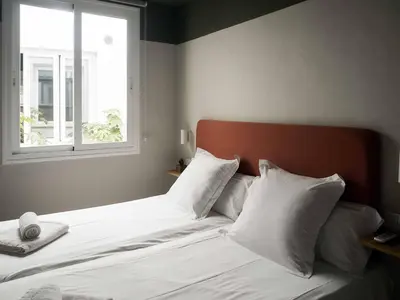 Cama o camas de una habitación en Capricho de la Judería Suites