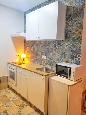 Una cocina o zona de cocina en Busto Reform