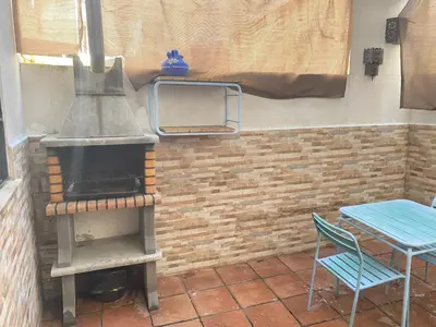 Plano de Apto con patio y barbacoa BBQ H de la Reina
