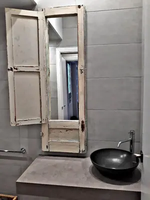 Un baño de Urban Suites El Postigo