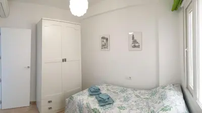 Cama o camas de una habitación en DS Apartamento Plaza Colón