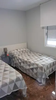 Cama o camas de una habitación en SAUCES - PARKING GRATIS - CLIMATIZADO