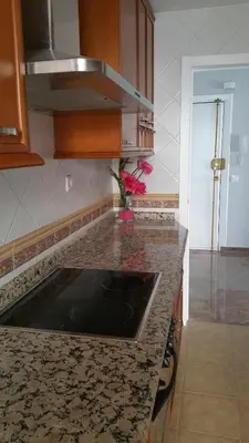 Una cocina o zona de cocina en SAUCES - PARKING GRATIS - CLIMATIZADO