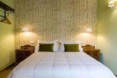 Cama o camas de una habitación en Hospedium Hotel El Nido de Alcudia Suites