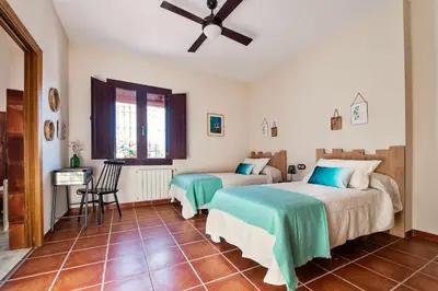 Cama o camas de una habitación en La Garrida, casa con encanto cerca de Córdoba