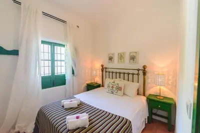 Cama o camas de una habitación en Huerta la Pimentada