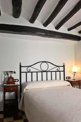 Cama o camas de una habitación en Hotel Zahorí