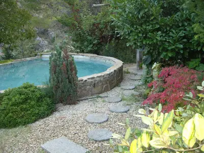 Piscina en o cerca de La Casita con piscina privada de tres dormitorios