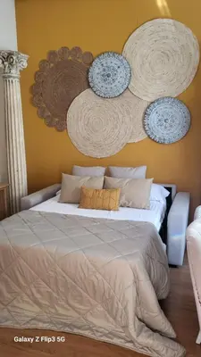Cama o camas de una habitación en APARTAMENTO CASA NARANJO