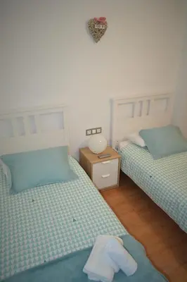 Cama o camas de una habitación en Guimar Esencia en el corazón de la judería