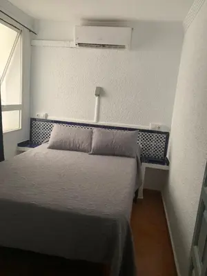 Cama o camas de una habitación en Hostal Alcobia