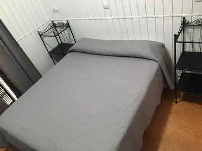 Cama o camas de una habitación en Hostal Alcobia