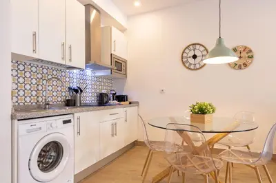 Una cocina o zona de cocina en Nine O'Clock Metrosol
