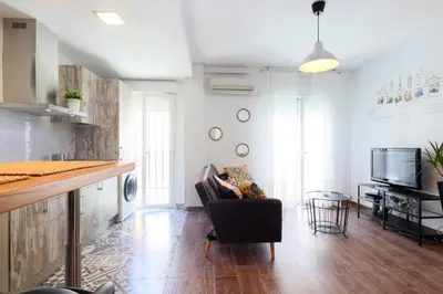 Una televisión o centro de entretenimiento en NEW Apartamento Tierra Andaluza junto Mezquita