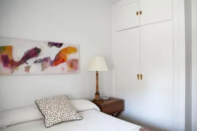 Cama o camas de una habitación en GRAN APARTAMENTO PLAZA DE ESPAÑA