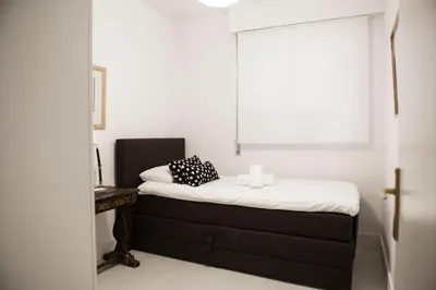 Cama o camas de una habitación en GRAN APARTAMENTO PLAZA DE ESPAÑA