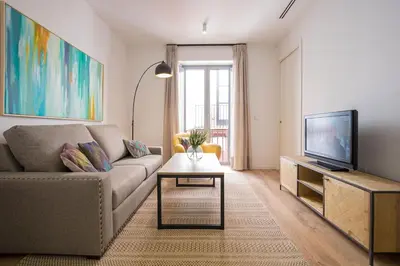 Una televisión o centro de entretenimiento en Armenta Deluxe Suite by Valcambre