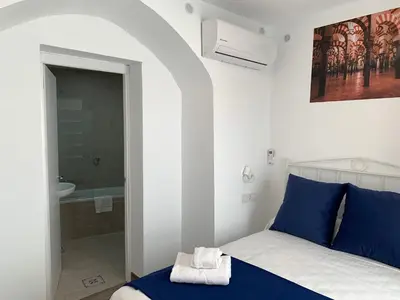 Cama o camas de una habitación en Belmonte Rooms