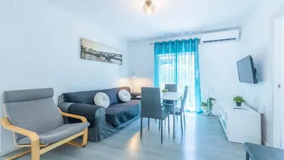 Una televisión o centro de entretenimiento en Apartamento Santa Justa