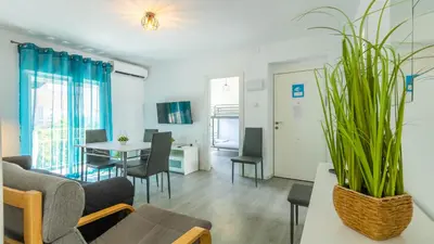 Una televisión o centro de entretenimiento en Apartamento Santa Justa