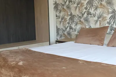 Cama o camas de una habitación en Apartamentos en Córdoba, Puente Romano y Torre Calahorra