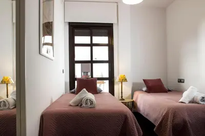 Cama o camas de una habitación en La Casa de Pepón