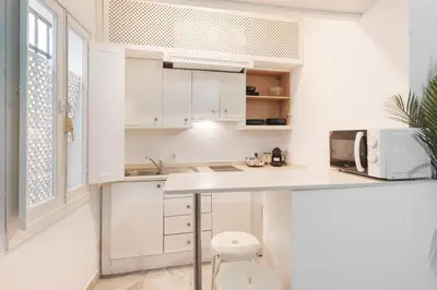 Una cocina o zona de cocina en Panther Home Alameda II
