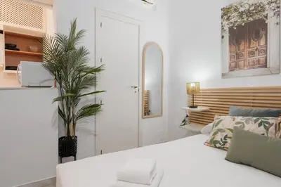 Cama o camas de una habitación en Panther Home Alameda II
