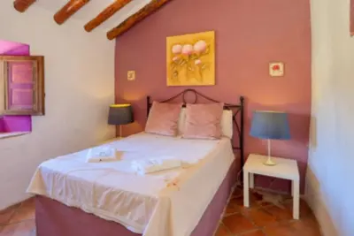 Cama o camas de una habitación en Cortijo Cuscurro