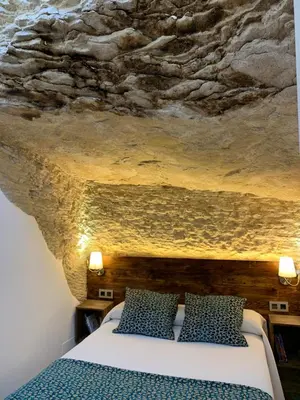 Cama o camas de una habitación en Casa Cueva El Puente