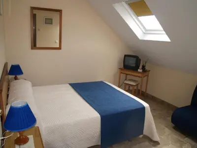 Cama o camas de una habitación en Hotel Al-Yussana