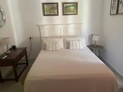 Cama o camas de una habitación en El nido del Chorro