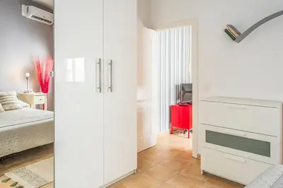 Cama o camas de una habitación en APARTAMENTO PASAJE VALVANERA