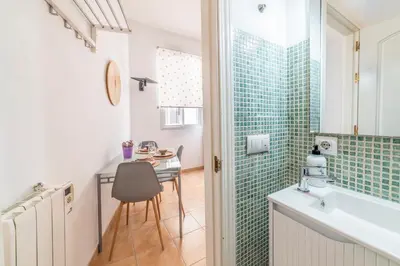 Un baño de APARTAMENTO PASAJE VALVANERA