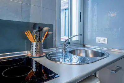 Una cocina o zona de cocina en APARTAMENTO PASAJE VALVANERA