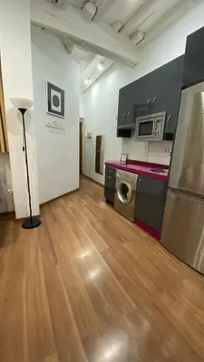 Una cocina o zona de cocina en ALOJAMIENTO LANZA en el CORAZÓN DE SEVILLA